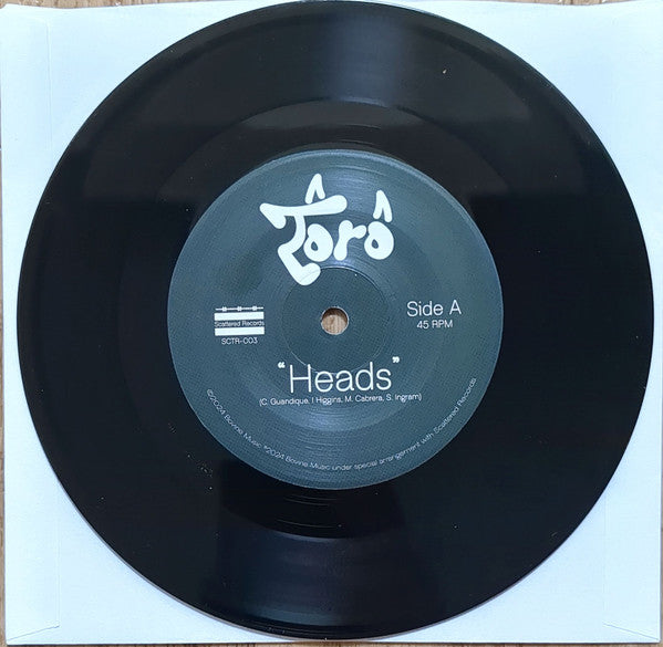 Toro (45) : Heads B/W It's Only Us (7", Single)