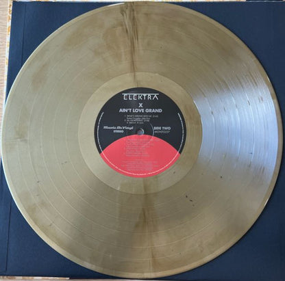 X (5) : Ain't Love Grand (LP, Album, RE, Gol)