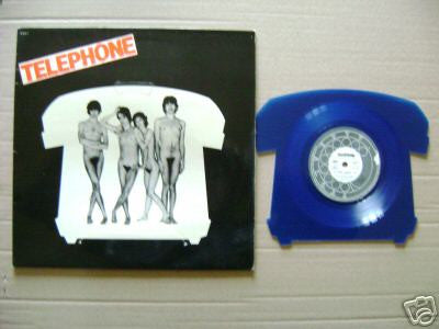 Telephone* : La Bombe Humaine/J'Suis Parti De Chez Mes Parents (7", Shape, Dar)
